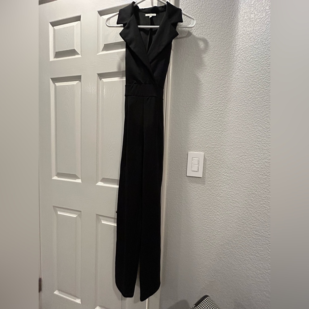 Charlotte Russe black jumpsuit/romper! Has a tie belt! Soft fabric, barely worn!
